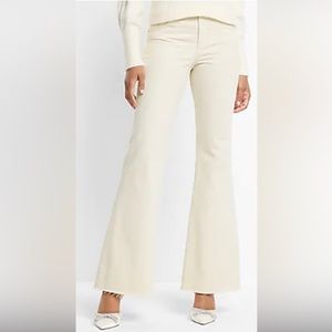 Express mid rise cream raw hem 70s flare jeans